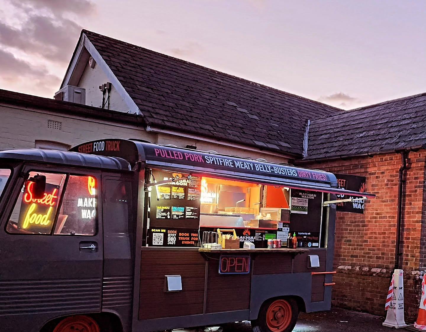 The Makhulu Wagon open for evening service outside Lindford Club at dusk