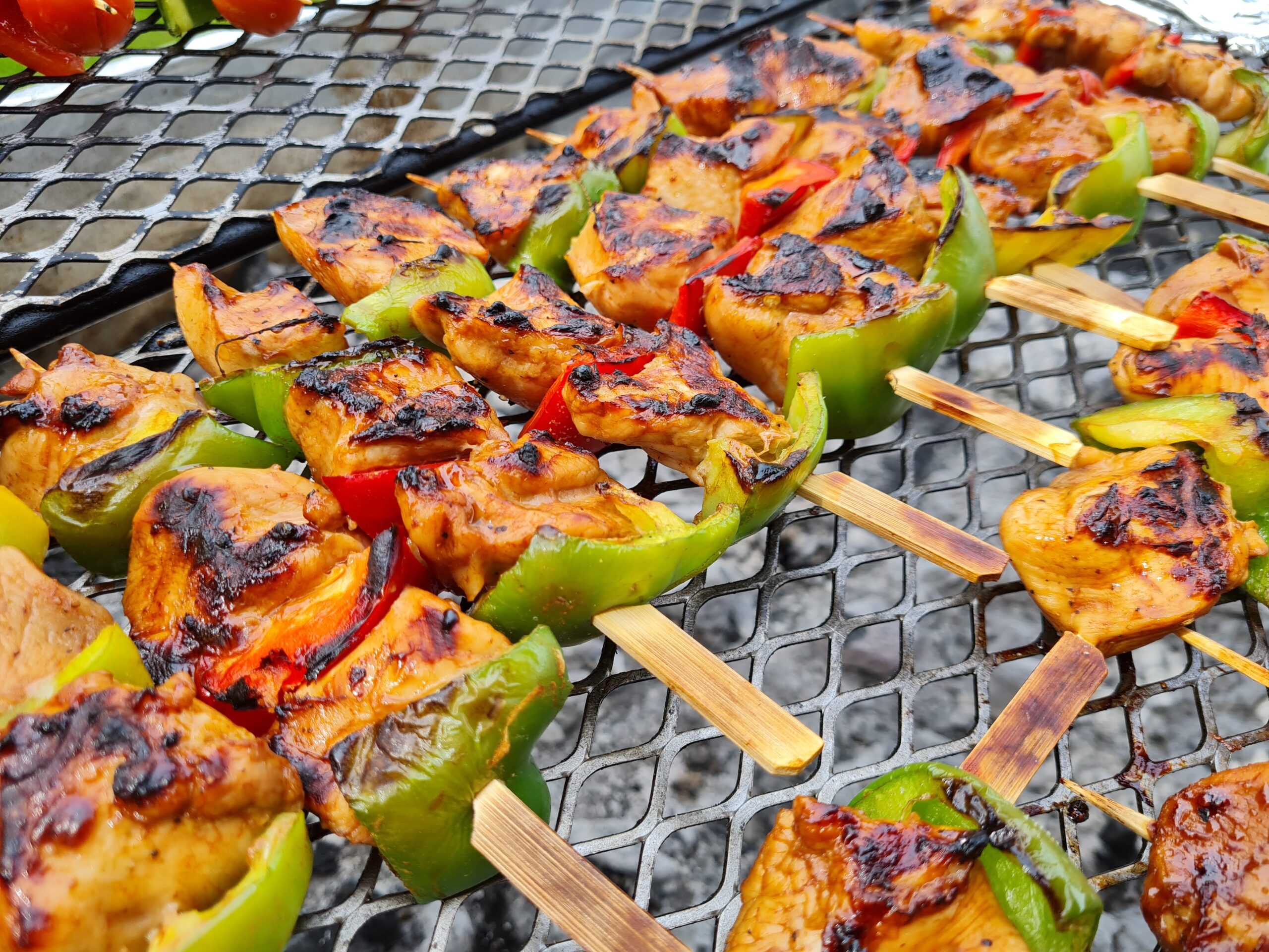 BBQ chicken skewers on the grill